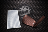No install tab foresight dots on a sheet next to a club head on a textured metal background with the JP Golf logo. 