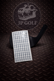 Sheet of golf club head dots for uneekor eye mini with JP Golf logo in the background on a textured metal surface
