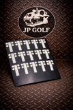 Black and white golf club tracking dots with the one tab 4 dot pattern with JP Golf logo on a textured metal surface