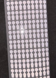 Uneekor eye mini club tracking dots on a backing sheet. 