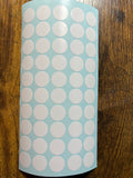 A pack of 50 white dots designed to be placed on a golf putter face, displayed against a blue background.