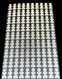 Foresight clubface dots with autism awareness applicator tab in a sheet. 