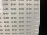 a sheet of dots designed for club data with the golf launch monitor on a black background. 