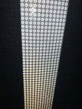 A roll of reflective dots used for enhancing golf launch monitor displays.