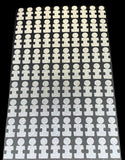 Foresight clubface dots with autism awareness applicator tab in a sheet. 