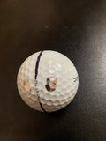 a comparison of overlapping two metal dots vs the just a potamus double dot on a golf ball. 